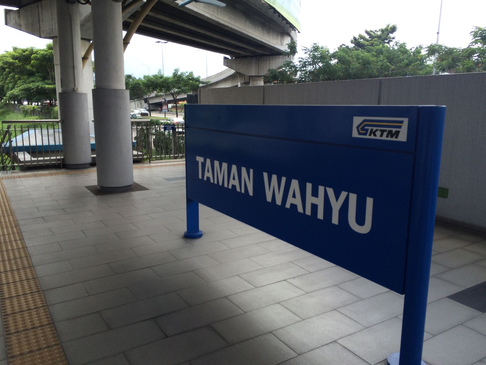 Taman Wahyu KTM Komuter platform with its blue station name board
