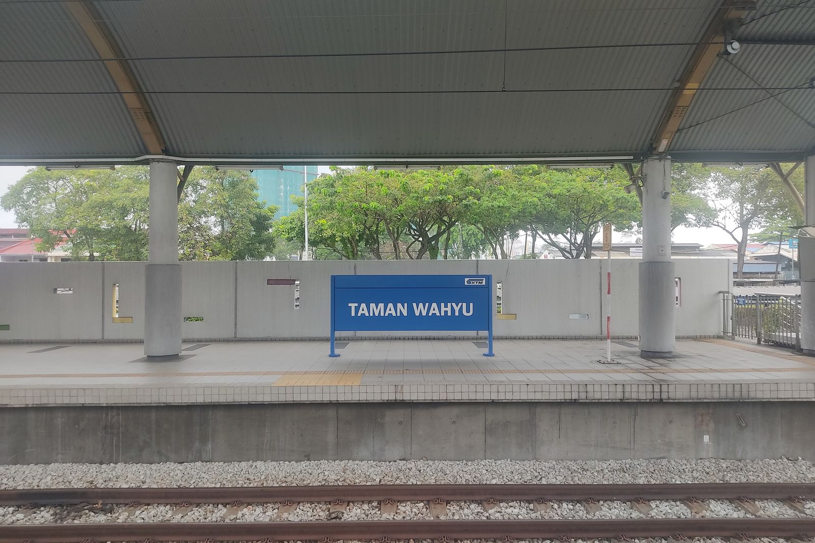 The Taman Wahyu name board on the KTM Komuter platform